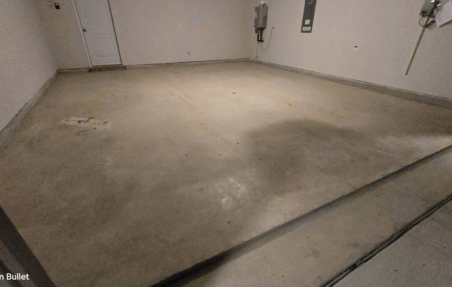 Before — bare concrete floor